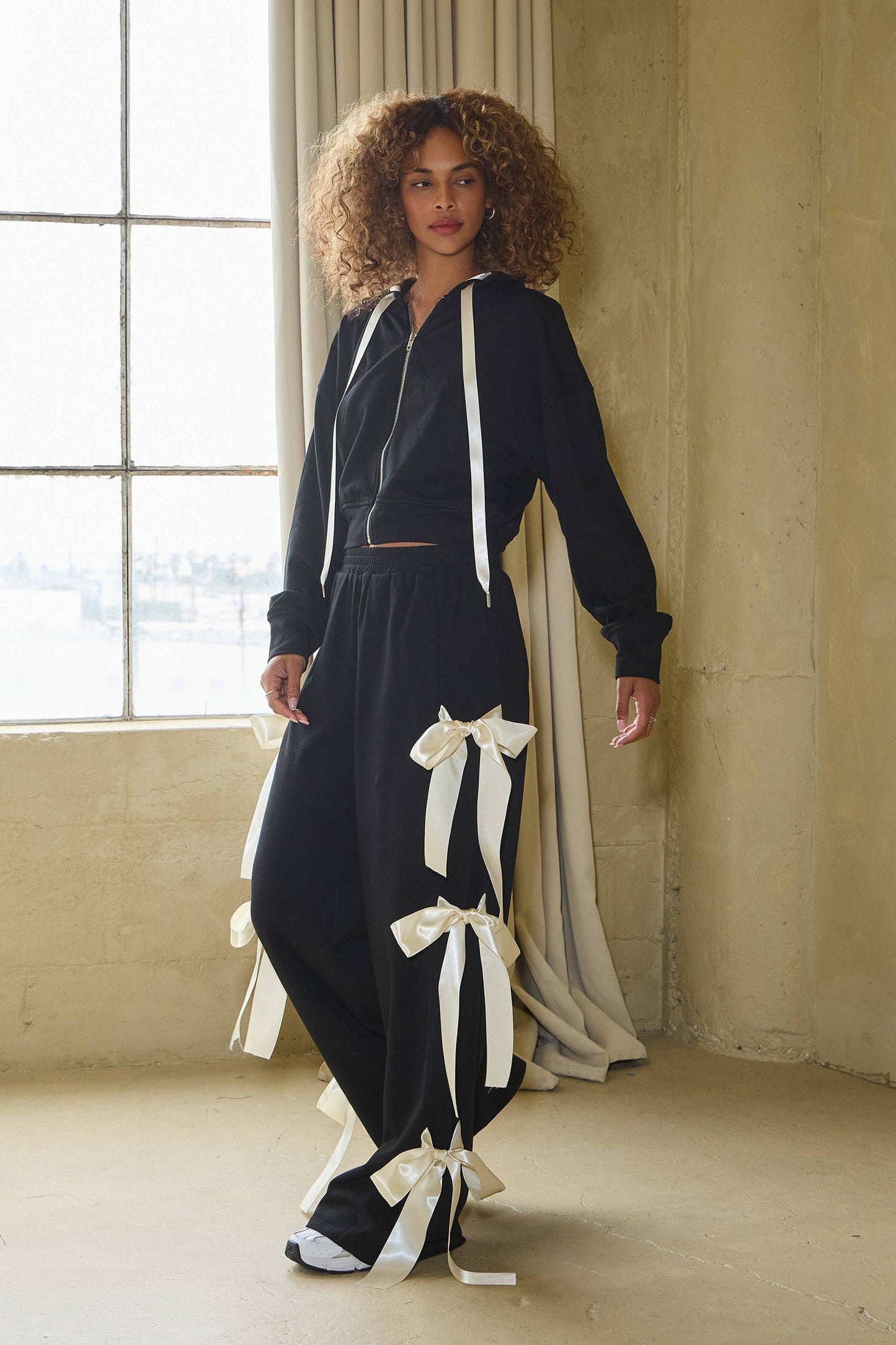 No Vacancy Women's Black French Terry Wide-Leg Pants with Satin Bow Ties