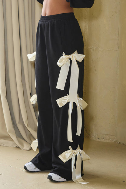 No Vacancy Women's Black French Terry Wide-Leg Pants with Satin Bow Ties
