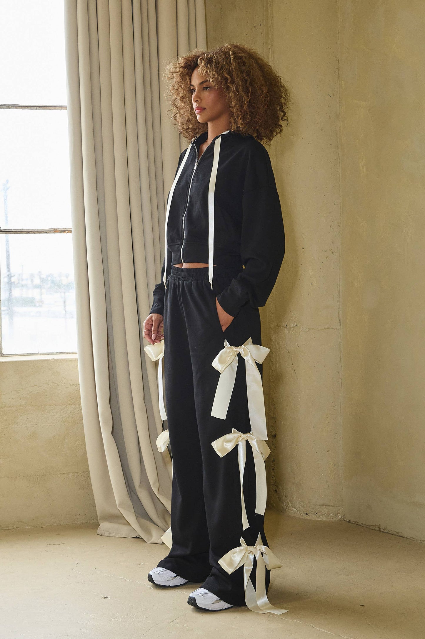 No Vacancy Women's Black French Terry Wide-Leg Pants with Satin Bow Ties