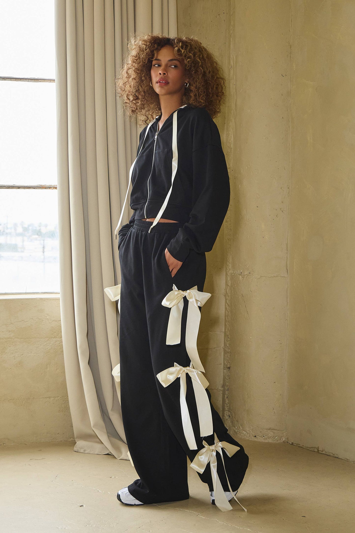 No Vacancy Women's Black French Terry Wide-Leg Pants with Satin Bow Ties